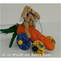 Bunnies about 5" tall sitting. Carrots about 7" long without fronds - Free Cloth Doll Pattern
